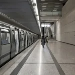 Dmitrovskaya Metro Station: Deep Gray Line Stop Beside the Rail Link